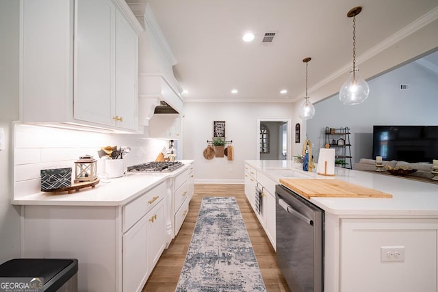 96 Cypress Trl, Fortson, GA 31808 - kitchen with stainless steel appliances, light wood-type flooring, light countertops, white cabinets, and recessed lighting
