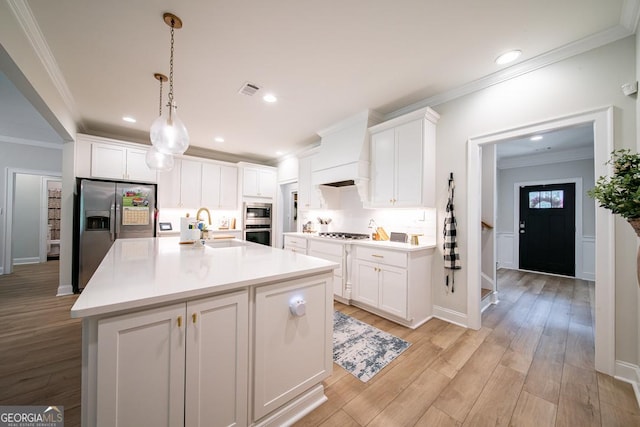 96 Cypress Trl, Fortson, GA 31808 - kitchen featuring stainless steel appliances, ornamental molding, white cabinetry, light wood-style floors, and light countertops