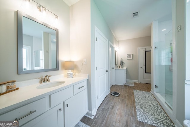 96 Cypress Trl, Fortson, GA 31808 - full bath with vanity, a shower stall, and wood finished floors