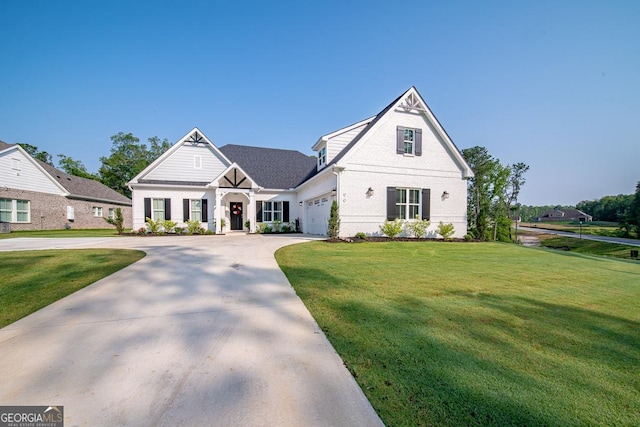 96 Cypress Trl, Fortson, GA 31808 - view of front of home featuring a front lawn, concrete driveway, and a garage