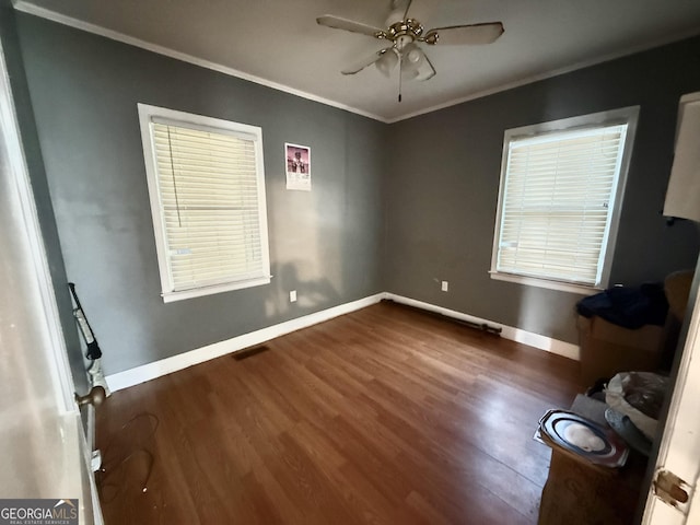 604 Spencer St, Barnesville, GA 30204 - unfurnished room with a ceiling fan, wood finished floors, and crown molding