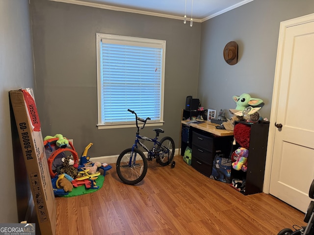604 Spencer St, Barnesville, GA 30204 - rec room featuring ornamental molding and wood finished floors