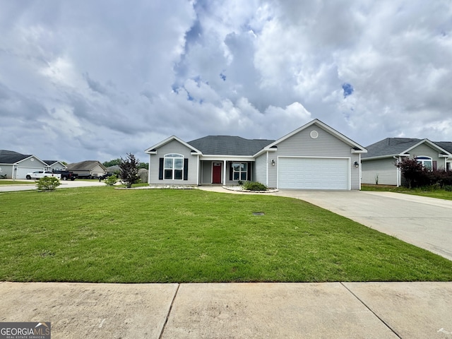 139 Raymond Cir, Warner Robins, GA 31088 - ranch-style house featuring concrete driveway, an attached garage, a front yard, and roof with shingles