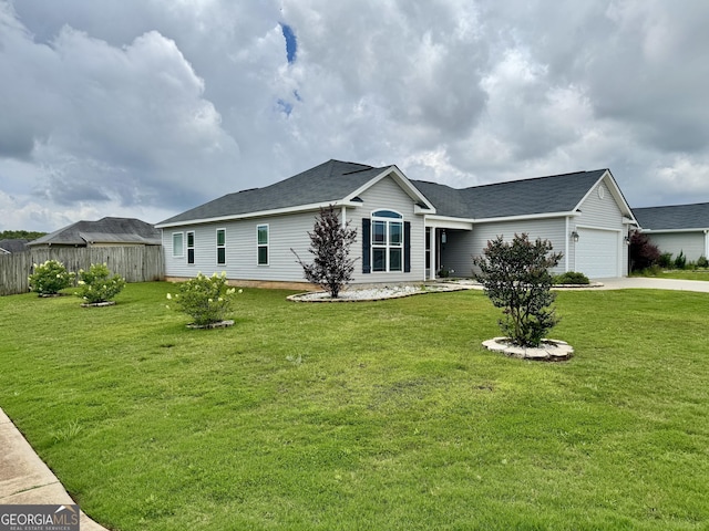 139 Raymond Cir, Warner Robins, GA 31088 - view of front of property with an attached garage, concrete driveway, and a shingled roof