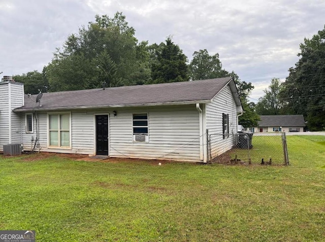 2433 Robin Ridge Dr, Dacula, GA 30019 - rear view of property with a chimney