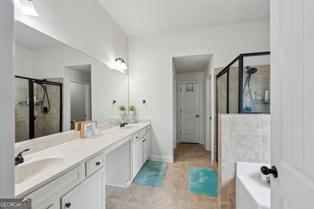 3225 Alhambra Cir, Hampton, GA 30228 - bathroom featuring a shower stall, double vanity, tile patterned flooring, and a bath