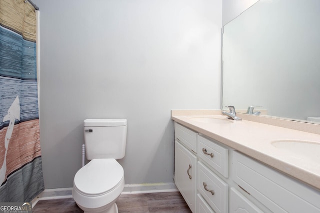 3470 Hill Ln, Acworth, GA 30102 - bathroom featuring baseboards and double vanity
