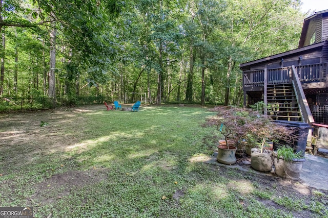 3470 Hill Ln, Acworth, GA 30102 - view of grassy yard with stairway and a wooden deck