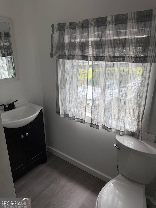 3052 Effingham Hwy, Sylvania, GA 30467 - bathroom featuring vanity and wood finished floors