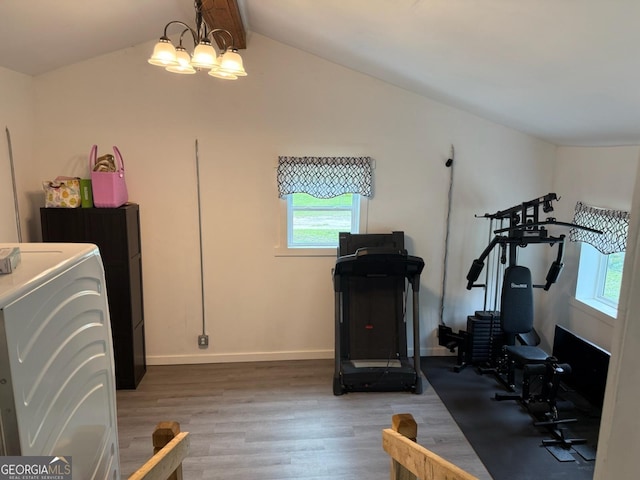 3052 Effingham Hwy, Sylvania, GA 30467 - exercise area with plenty of natural light, washer / dryer, light wood finished floors, and lofted ceiling