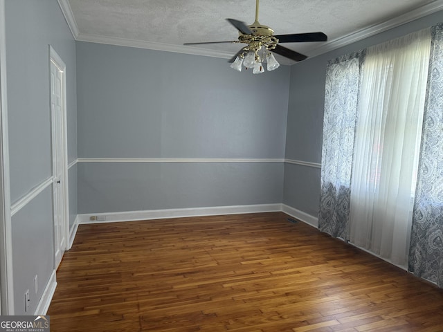 163 NW R St, Thomaston, GA 30286 - empty room featuring wood-type flooring, ceiling fan, crown molding, and a textured ceiling
