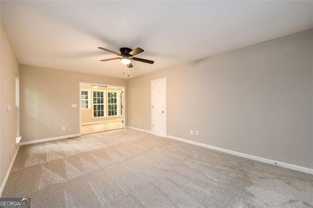 3105 The Trail Rd, Gainesville, GA 30501 - spare room featuring a ceiling fan and light colored carpet