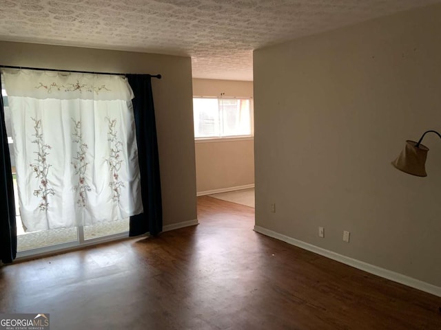 182 Viking Ct Unit 3, Athens, GA 30605 - empty room featuring wood finished floors and a textured ceiling