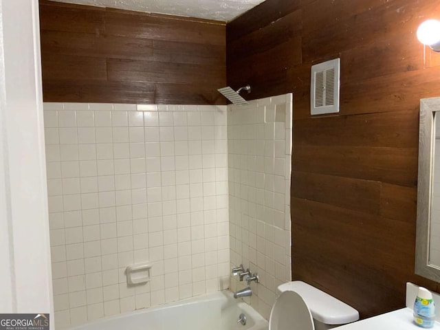 182 Viking Ct Unit 3, Athens, GA 30605 - bathroom with wooden walls and shower / bath combination