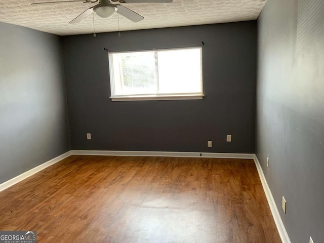 182 Viking Ct Unit 3, Athens, GA 30605 - empty room featuring ceiling fan, a textured ceiling, and wood finished floors