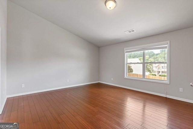 1238 New Liberty Way, Braselton, GA 30517 - empty room with lofted ceiling and wood finished floors