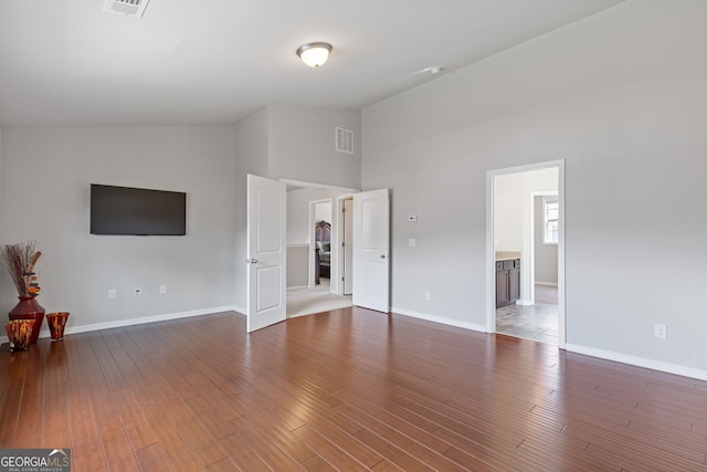 1238 New Liberty Way, Braselton, GA 30517 - unfurnished living room featuring high vaulted ceiling and wood finished floors