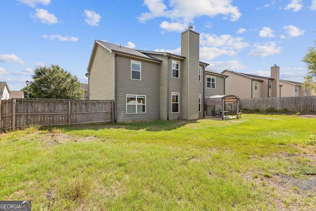 1238 New Liberty Way, Braselton, GA 30517 - rear view of property with a fenced backyard and a chimney