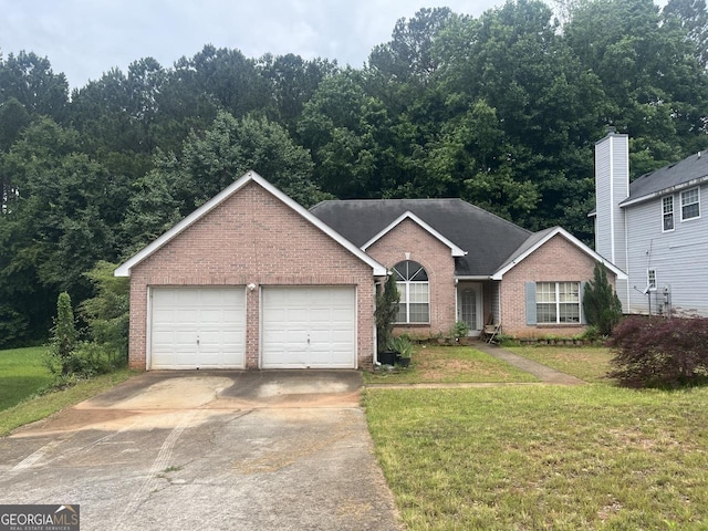 7513 Sugarcreek Dr, Riverdale, GA 30296 - single story home with brick siding, driveway, a front yard, and a garage