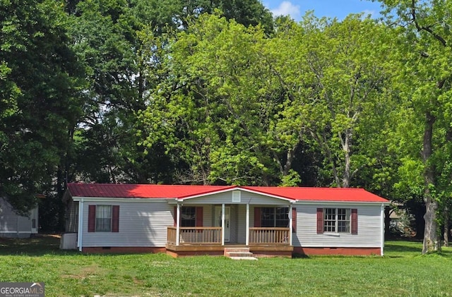 50 E College St, Royston, GA 30662 - view of front of property featuring crawl space, a porch, a front lawn, and a metal roof