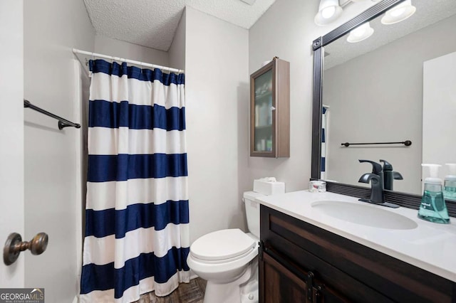 140 Indian Ridge Ct, Waleska, GA 30183 - bathroom with vanity, a textured ceiling, curtained shower, and wood finished floors