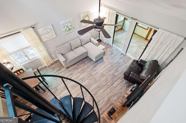 140 Indian Ridge Ct, Waleska, GA 30183 - living room with ceiling fan, wood finished floors, and a textured ceiling