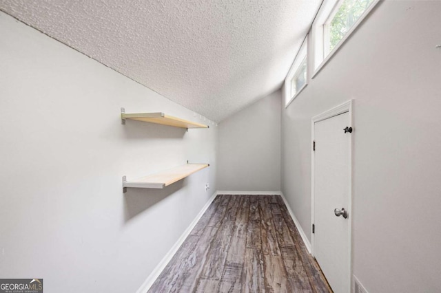 140 Indian Ridge Ct, Waleska, GA 30183 - corridor featuring a textured ceiling and wood finished floors