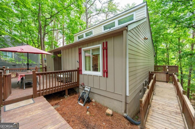 140 Indian Ridge Ct, Waleska, GA 30183 - wooden deck featuring outdoor dining area
