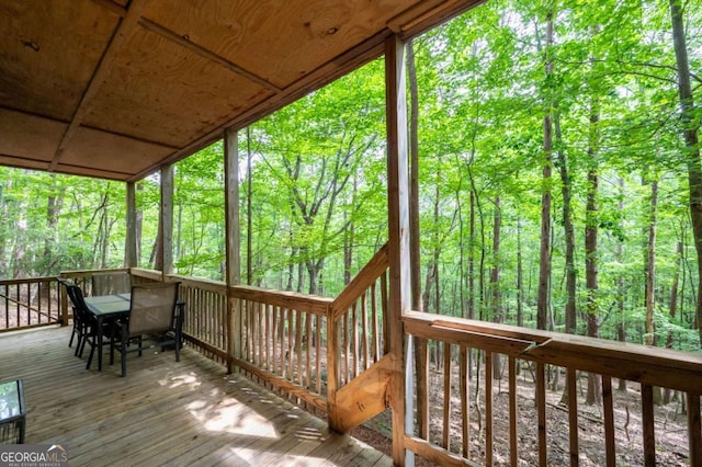 140 Indian Ridge Ct, Waleska, GA 30183 - wooden deck featuring outdoor dining space and a forest view