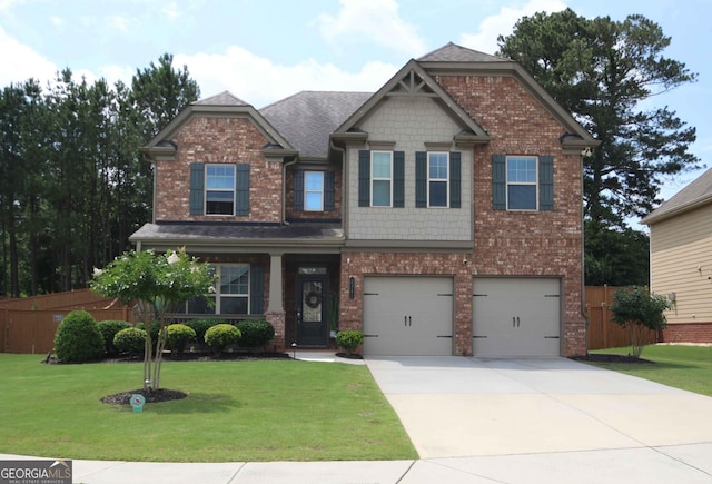 2311 Arnold Palmer Way, Duluth, GA 30096 - craftsman-style house featuring an attached garage, concrete driveway, brick siding, and a shingled roof