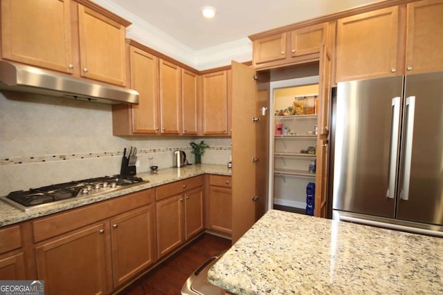 2311 Arnold Palmer Way, Duluth, GA 30096 - kitchen with stainless steel appliances, under cabinet range hood, light stone counters, recessed lighting, and ornamental molding