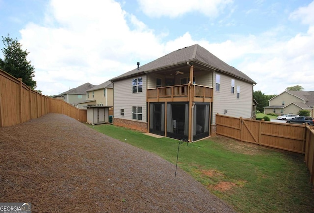 2311 Arnold Palmer Way, Duluth, GA 30096 - back of property featuring a balcony, a ceiling fan, a sunroom, and a fenced backyard