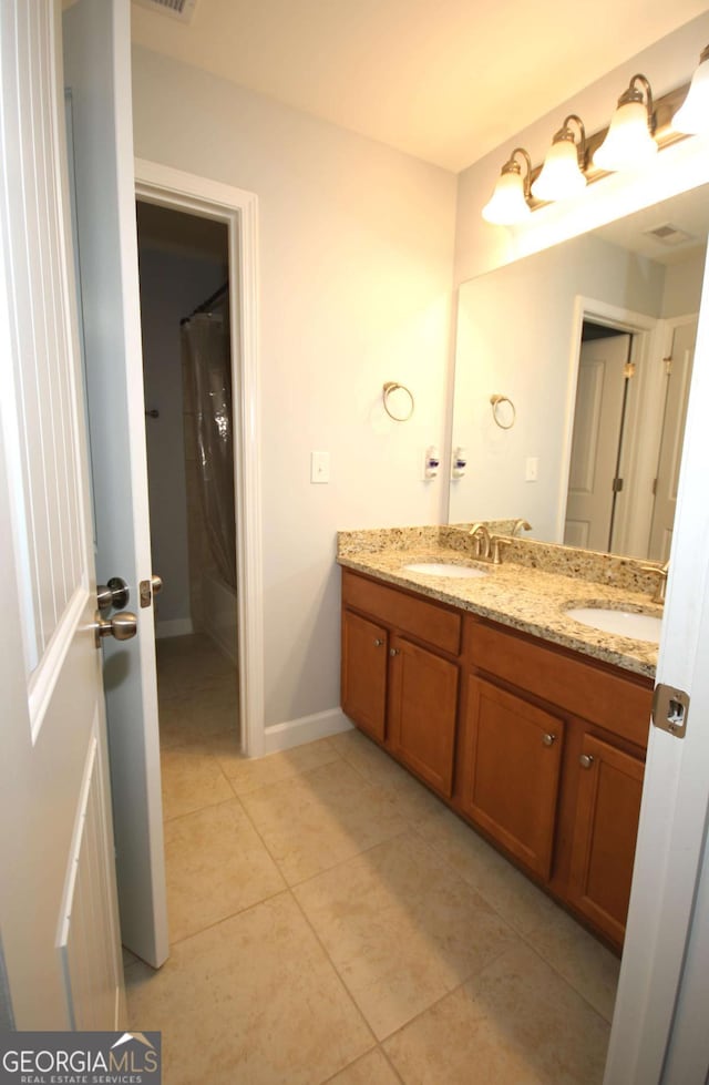2311 Arnold Palmer Way, Duluth, GA 30096 - bathroom with double vanity, tile patterned flooring, and a shower with shower curtain