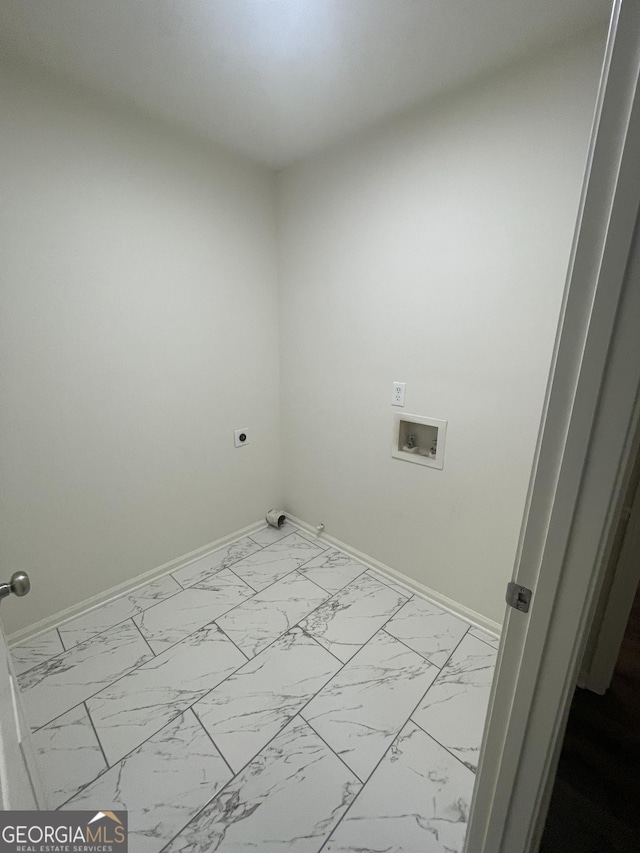 56 Ridgewood Ct, Mcdonough, GA 30252 - washroom featuring marble look tiles, hookup for a washing machine, and hookup for an electric dryer