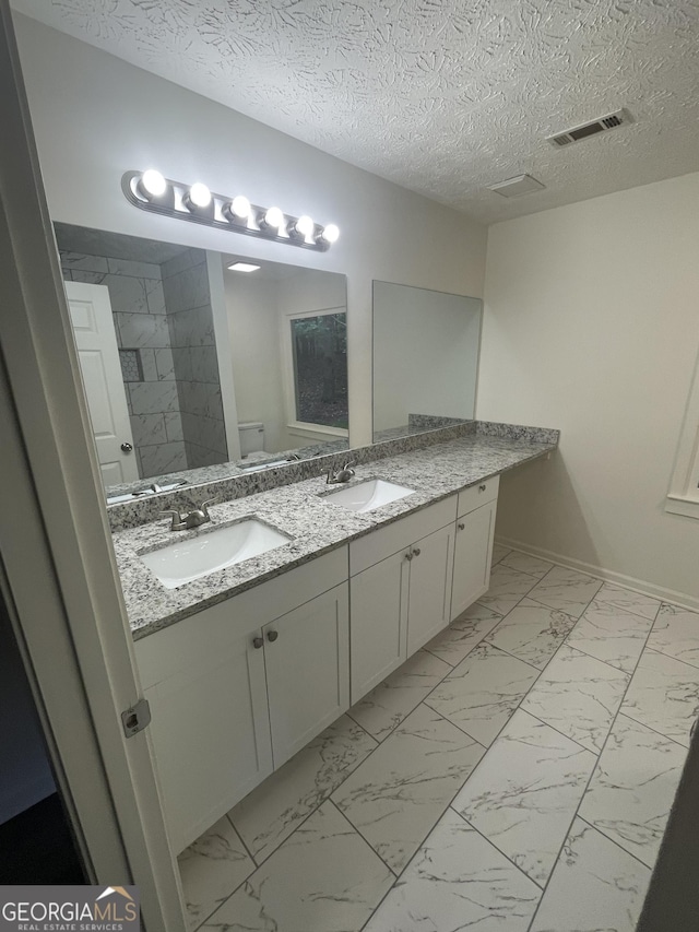 56 Ridgewood Ct, Mcdonough, GA 30252 - full bathroom with marble look tiles and double vanity