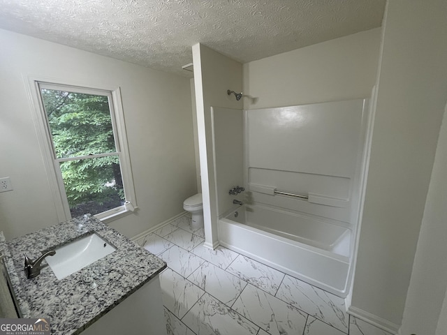 56 Ridgewood Ct, Mcdonough, GA 30252 - bathroom with marble look tiles, vanity, shower / bath combination, and a textured ceiling