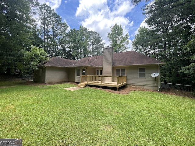 56 Ridgewood Ct, Mcdonough, GA 30252 - rear view of property with a deck and a chimney