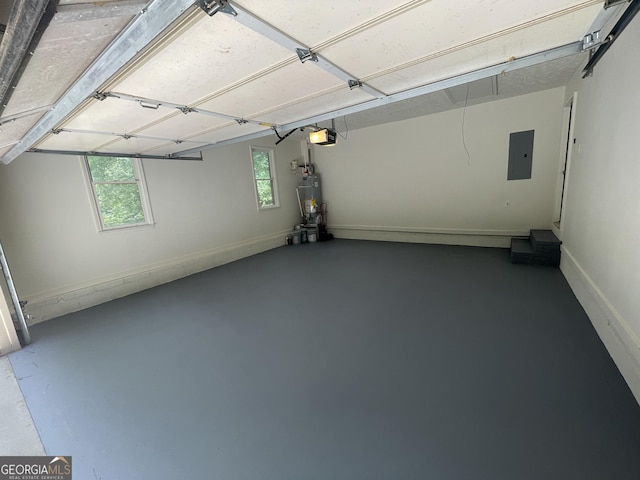 56 Ridgewood Ct, Mcdonough, GA 30252 - garage featuring a garage door opener, electric panel, and gas water heater