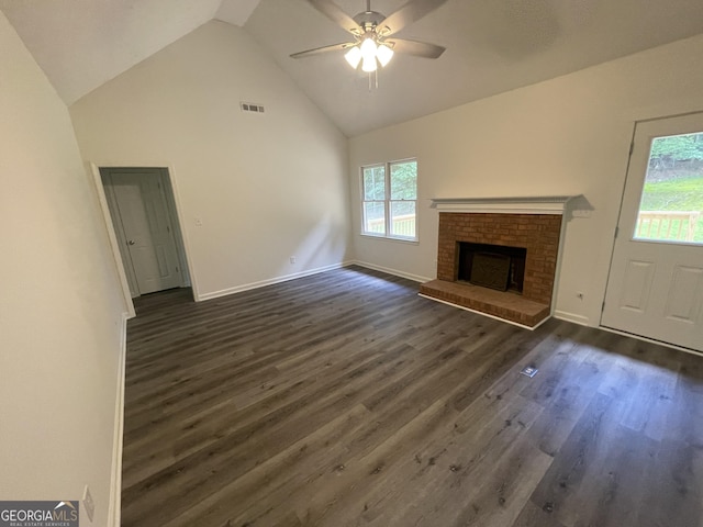 56 Ridgewood Ct, Mcdonough, GA 30252 - unfurnished living room featuring dark wood-type flooring, plenty of natural light, high vaulted ceiling, and a ceiling fan
