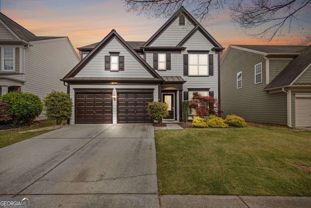 610 Syemore Pass, Canton, GA 30115 - traditional-style house featuring concrete driveway, a front yard, and a garage