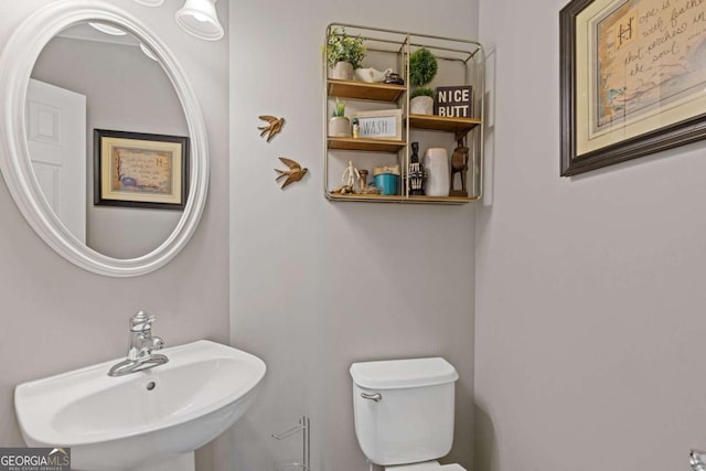 610 Syemore Pass, Canton, GA 30115 - half bath featuring a sink and toilet