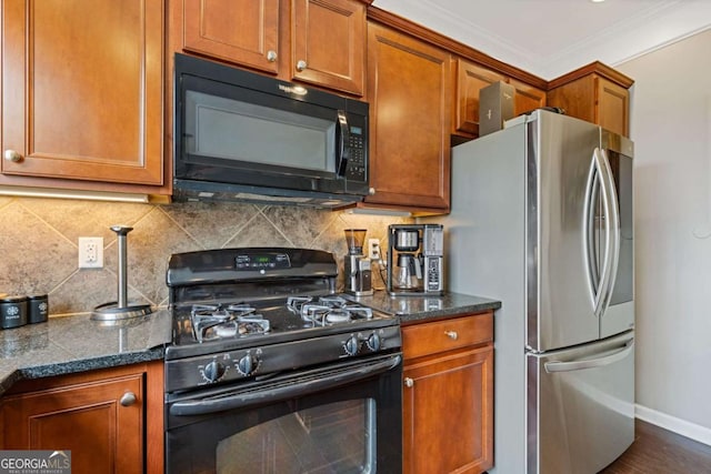 610 Syemore Pass, Canton, GA 30115 - kitchen featuring black appliances, brown cabinetry, tasteful backsplash, dark stone counters, and crown molding
