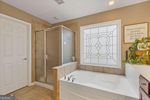 610 Syemore Pass, Canton, GA 30115 - bathroom with a shower stall, a bath, and tile patterned flooring
