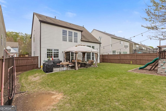 610 Syemore Pass, Canton, GA 30115 - rear view of property featuring an outdoor living space, a playground, a gazebo, a patio area, and a fenced backyard