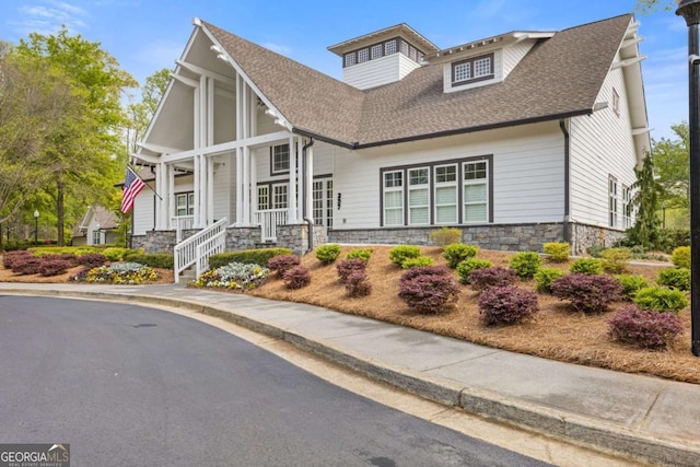 610 Syemore Pass, Canton, GA 30115 - view of front facade featuring stone siding and a shingled roof