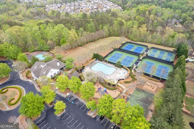 610 Syemore Pass, Canton, GA 30115 - aerial overview of property's location featuring a pool area and a heavily wooded area