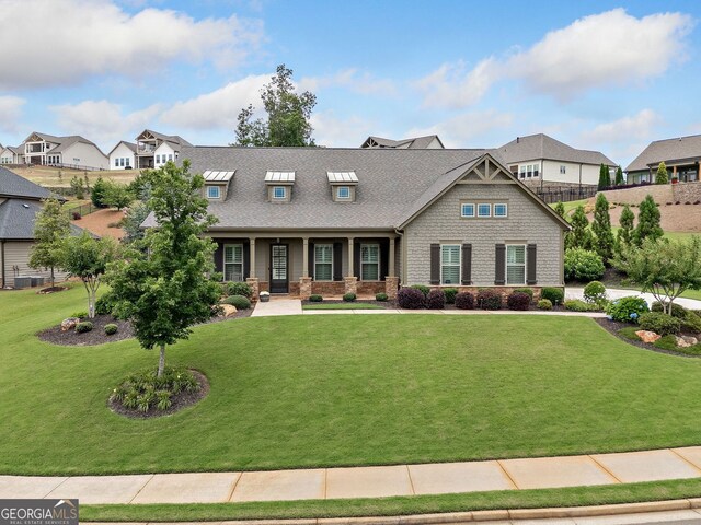 406 Horizon Trl, Canton, GA 30114 - craftsman inspired home with a porch, a front lawn, and a residential view