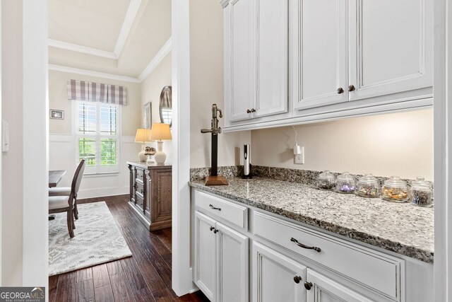 406 Horizon Trl, Canton, GA 30114 - kitchen with crown molding, dark wood finished floors, light stone countertops, and white cabinetry