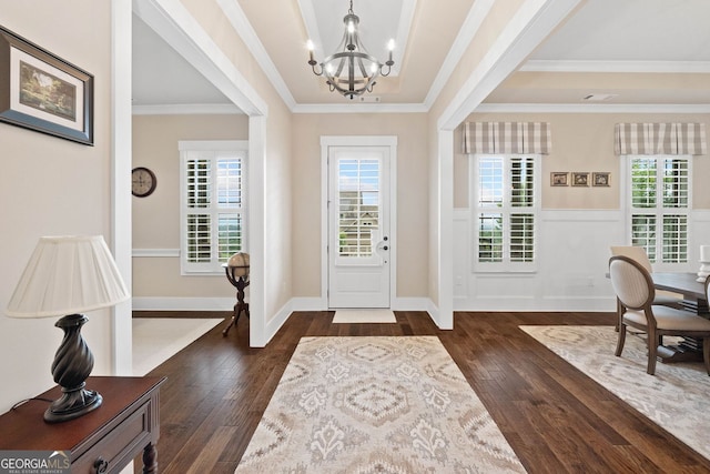 406 Horizon Trl, Canton, GA 30114 - entrance foyer with a chandelier, dark wood-type flooring, healthy amount of natural light, crown molding, and a raised ceiling