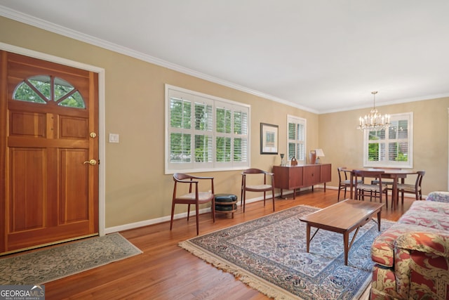 2790 Laurel Ridge Dr, Decatur, GA 30033 - living area with a chandelier, healthy amount of natural light, wood finished floors, and crown molding
